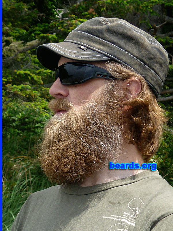 Eric
Bearded since: 1999.  I am a dedicated, permanent beard grower.

Comments:
Why did I grow my beard? 
It was time.  

I always kept it neat and no more than an inch and bit and then came the concussion in September 2011. I couldn't handle noise for a while so trimming was out of the question.  I have never looked back.  It is currently about seven-to-eight inches.

How do I feel about my beard? Love it. Don't leave home without it!
Keywords: full_beard