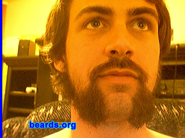 Jake
Bearded since: 2007.  I am an experimental beard grower.

Comments:
Caught a cold, didn't shave for about a week or so, then had a week off of work. During this time, a friend of mine challenged me to see who could go without shaving longer. Long story short, he shaved after about two weeks and I kept going.

How do I feel about my beard?  Very good. I like having a distinguishing facial feature that is so prominent.
Keywords: mutton_chops