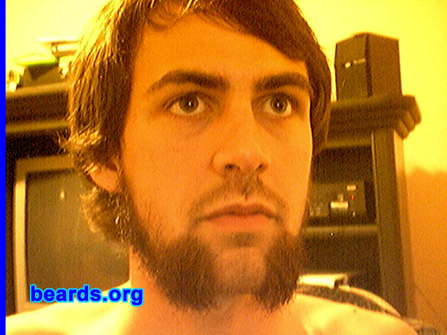 Jake
Bearded since: 2007.  I am an experimental beard grower.

Comments:
Caught a cold, didn't shave for about a week or so, then had a week off of work. During this time, a friend of mine challenged me to see who could go without shaving longer. Long story short, he shaved after about two weeks and I kept going.

How do I feel about my beard?  Very good. I like having a distinguishing facial feature that is so prominent.
Keywords: mutton_chops
