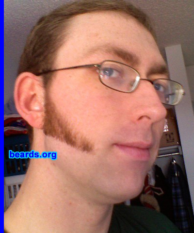 Ryan C.
Bearded since: 2007.  I am a dedicated, permanent beard grower.

Comments:
I mainly grow it for the War of 1812 reenacting that I do.  But I just tend to like them, so I keep it up.

How do I feel about my beard?  Plain and simply I like it.
Keywords: sideburns