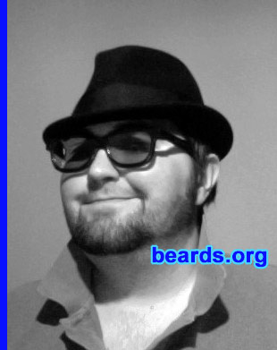 Simon P.
Bearded since: 2006. I am a dedicated, permanent beard grower.

Comments:
I have always wanted to grow a full beard and have always had some small form of it in one way or another. I have tried several times in the past, but always had to shave it for various reasons. Now I am in a job and have a lifestyle where having a beard is acceptable. My latest attempt just started a few weeks ago and is ongoing.

How do I feel about my beard? Right now; it is a little short for a full beard, but I love having some form of beard be it chin strap, goatee, or mutton chops. I am eager to see what it looks like in a few weeks.
Keywords: stubble full_beard