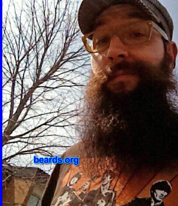 Travis D.
Bearded since: 2001. I am a dedicated, permanent beard grower.

Comments:
Why did I grow my beard? I have always had facial hair of some sort. I got to the point where trimming was not an option and decided to let the beard go and grow and do its own thing!

How do I feel about my beard? My beard is a part of me and my life! Bearding has turned into away of life!!
Keywords: full_beard
