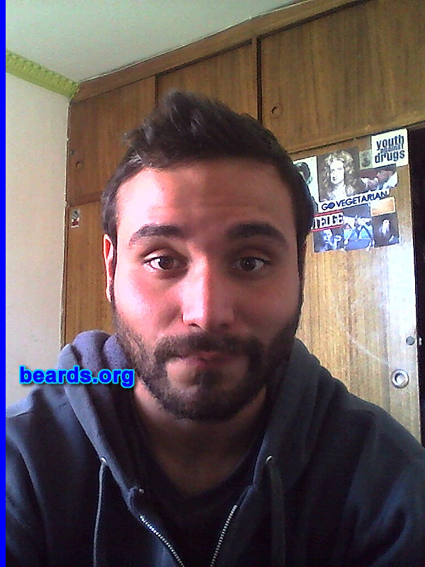 Felipe B.
Bearded since: 2011. I am a dedicated, permanent beard grower.

Comments:
Why did I grow my beard? My beard is part of me. Why do I have to remove it? When I was in high school, I always had issues with the principal (in Chile we're not allowed to wear facial hair at school). He always made us shave before going into classes. Because of that, as soon as I finished school (2010), I started wearing a beard. I started wearing a mustache and chin curtain, and then a goatee and mustache. And since 2011 (nineteen years old), I started wearing a full beard. When it grows too much, I cut it with my hair clippers (about one centimeter of length). My uncles wear beards, too.

How do I feel about my beard? I feel awesome. People say that I look interesting wearing my beard. And when it is winter, it is like I'm using a scarf. LOL. 
Keywords: full_beard
