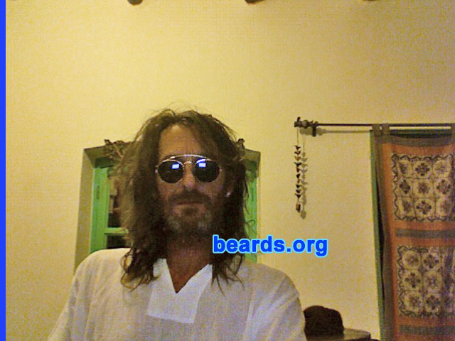 Scott B.
Bearded since: 2009.  I am an experimental beard grower.

Comments:
I grew my beard just for a change and for the extra time out of the bathroom and because my dad had one.

How do I feel about my beard?  I love it.  And my chick loves it, too.
Keywords: full_beard