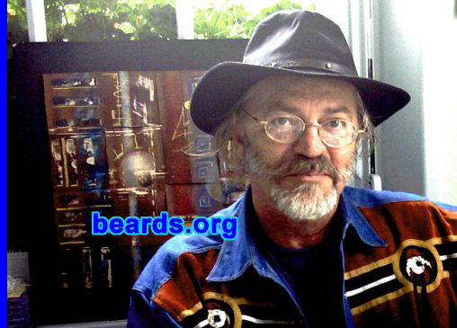 Jean Luc Malandain
Bearded since: 1966.  I am a dedicated, permanent beard grower.
I grew my beard first as a "contrary" young man, in the pre-1968 period, at the same time as I grew my hair... Apart from the Beatles, my "model" then was John Mayall, whose "goat" looked so elegant to me..! 40 years later, I still believe in any "meaning" in wearing a beard and long hair... And whenever I made the mistake of cutting one or the other... I felt soooo coooold ..!

How do I feel about my beard?  Fine, thanks ..! I'm happy it's turning to silver-grey... And "they" say "they" never felt such a soft and teasing one..!
Keywords: full_beard