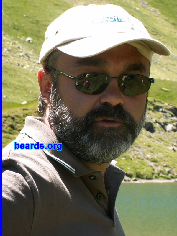 Philippe
Bearded since: 1997.  I am a dedicated, permanent beard grower.

Comments:
I grew my beard because I am too lazy to shave every day. I love having hair on my face.

How do I feel about my beard?  I feel very confortable.  It is very thick and soft..
Keywords: full_beard
