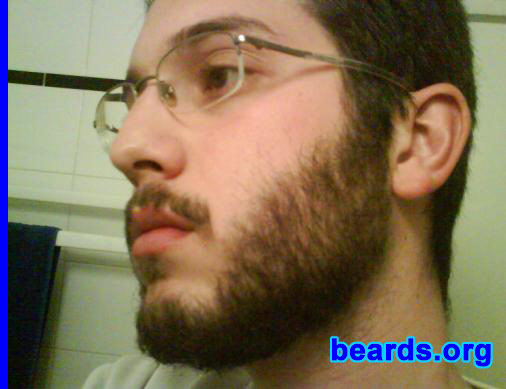 Yannis
Bearded since: 2007.  I am an experimental beard grower.

Comments:
I grew my beard because I just wanted to be like my ancestors: Socrates, Aristotle, Pericles... Just kidding!...

Being one year in the army, it was long enough to get sick of shaving every day. As soon as it was over, I started to grow a goatee out of reaction. Unfortunately my efforts in shaping it weren't that successful and looking for information on the Internet, I found this site. After a while I decided to try to grow a full beard, something that I hadn't thought before. In fact I thought that I wasn't able to grow one and also it was too itchy for me to tolerate. These photos are taken after forty days of not shaving and some trimming. I hope it's popular with the ladies! (Hopefully from now on they won't mistake me for a twenty-year-old. I'm twenty-seven.)

How do I feel about my beard? I think it's cool! It's something new for me. It's weird, but I feel more confident. It's far from perfect (especially the mustache and lower lip areas), but I'm proud of it.
Keywords: full_beard