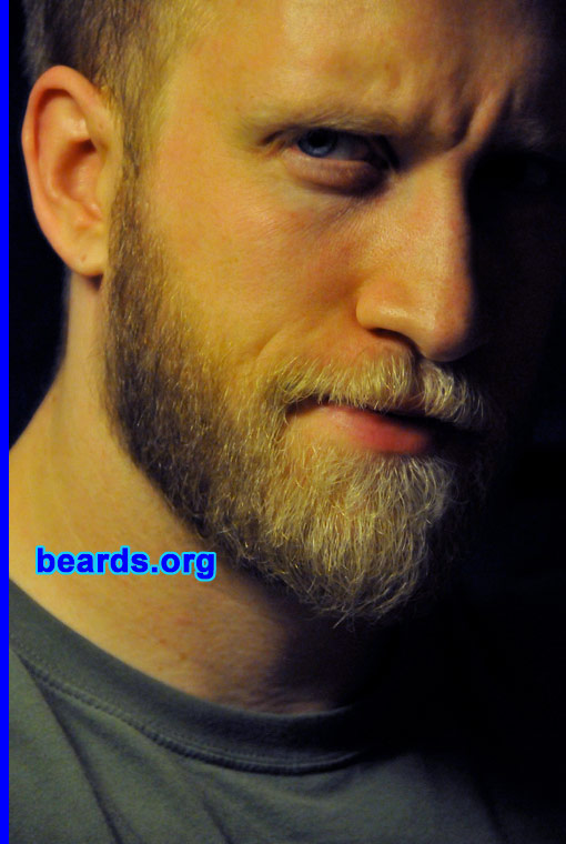 Roger
Bearded since: 2008.  I am an experimental beard grower.

Comments:
After going through life so far without trying a full beard, I thought it was about time to see what it would look like. I've had sideburns at different lengths all my adult life, but never gone full. I've always liked beards, but I've had hesitation to let it grow because I just thought it wouldn't look good, especially because the mustache and chin are much blonder than the sides. 

But how do you know until you try?

How do I feel about my beard? I definitely had some doubts during the first month of growing. But now I think I quite like my beard. I feel that I look more like the person that I feel I am. I'm a big guy and a smooth face never felt right. 

I work in Hong Kong, and it gets very hot and humid here in the summer, so I may shave it, but if I do that, it will definitely return again in the autumn! Here, there are very few tall blondes with full blonde beards, so I definitely stand out. And hey, that's not such a bad thing?
Keywords: full_beard