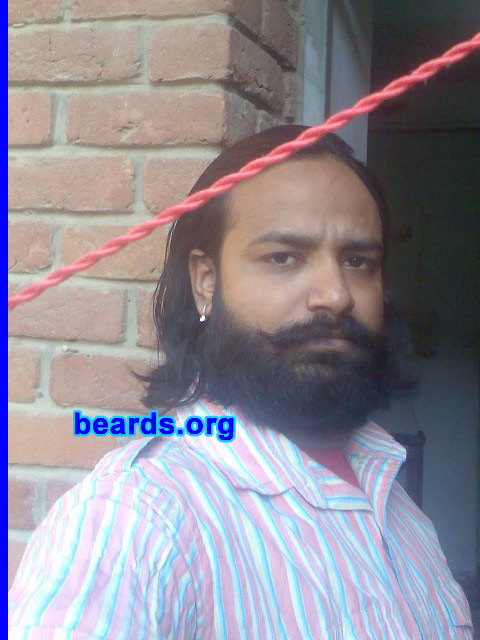 Laxman S.
Bearded since: 1997.  I am an occasional or seasonal beard grower.

Comments:
I like a beard because I think I look more serious and sober in a beard. Even women also find "machoness" in a bearded man.

How do I feel about my beard?  It's a fine beard.  But I want to experiment with my beard.
Keywords: full_beard