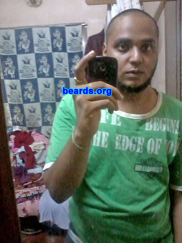 Nithin
Bearded since: 2009. I am a dedicated, permanent beard grower.

Comments:
Why did I grow my beard?  It grows all by itself. ;)

How do I feel about my beard?  Proud to be a man.
Keywords: chin_curtain