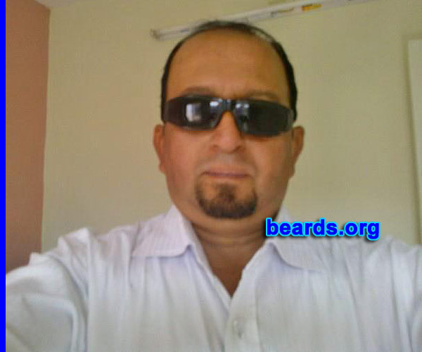 Sandeep G.
Bearded since: 2009.  I am a dedicated, permanent beard grower.

Comments:
Why did I grow my beard? I like the beard. I look better and have a more impressive personality.

How do I feel about my beard? I love my beard.
Keywords: goatee_only