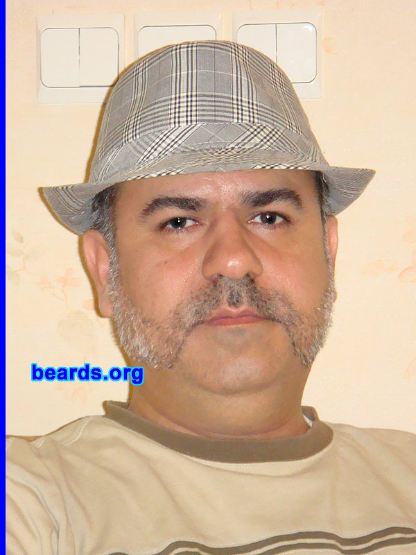 Fares
Bearded since: 2010.  I am an experimental beard grower.

Comments:
Why did I grow my beard? Just decided to do so after fourteen years of shaving.

How do I feel about my beard? I like it.  But I look like a stranger to my wife now.
Keywords: mutton_chops