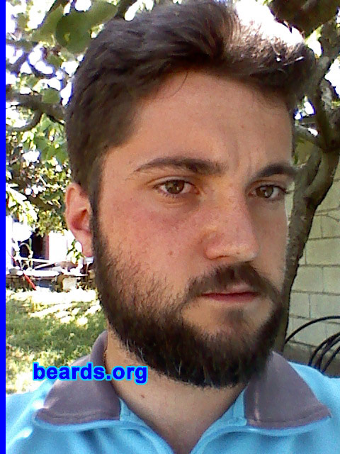 Elio
Bearded since: December 2011.

Comments:
I grew my beard because I like it, also because it makes me feel more manly and more confident.  Although I'd like the mustache thicker and the cheeks fuller, it's okay.

How do I feel about my beard?  I love it.
Keywords: full_beard