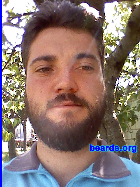 Elio
Bearded since: December 2011.

Comments:
I grew my beard because I like it, also because it makes me feel more manly and more confident.  Although I'd like the mustache thicker and the cheeks fuller, it's okay.

How do I feel about my beard?  I love it.
Keywords: full_beard