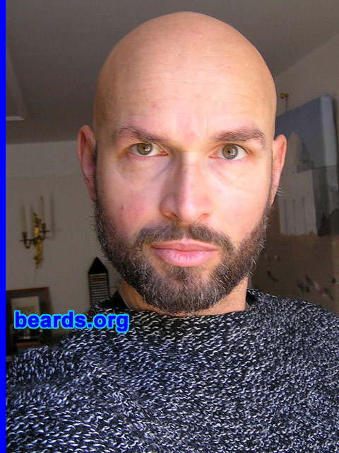 Gil
Bearded since: 1989.  I am a dedicated, permanent beard grower.

Comments:
I grew my beard because l always liked to see it on other men. I think it looks very attractive, masculine, and sympathetic. I liked also beards on historic portraits (Renaissance, for example, or 19th century) or in other cultures.  Gives the image of masculinity and keeping what Nature has given to us. For me it's also a synonym of independence and freedom. I like also very much the combination of shaved head and facial hair.

I started with a goatee, then changed to beard then goatee and back to beard....as it is very curly as my hair was, it appears sometimes difficult to grow it longer, usually I trim it between 4 and 7mm. But I like it and would not like to shave it away. 
Keywords: full_beard