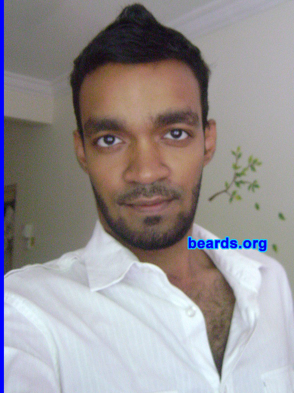 Ahmed H.
Bearded since: 2010. I am a dedicated, permanent beard grower.

Comments:
I grew my beard because I went without shaving for a week and then just thought of growing it out.

How do I feel about my beard?  Awesome! It is the coolest thing ever to wake up everyday and feel your beard while washing your face. I'm comfortable with showing off my manliness like a signature on my face.
Keywords: chin_curtain