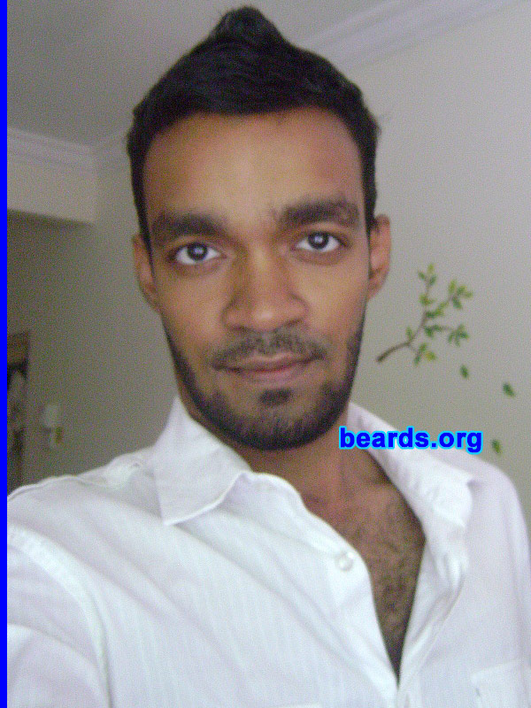 Ahmed H.
Bearded since: 2010. I am a dedicated, permanent beard grower.

Comments:
I grew my beard because I went without shaving for a week and then just thought of growing it out.

How do I feel about my beard?  Awesome! It is the coolest thing ever to wake up everyday and feel your beard while washing your face. I'm comfortable with showing off my manliness like a signature on my face.
Keywords: chin_curtain