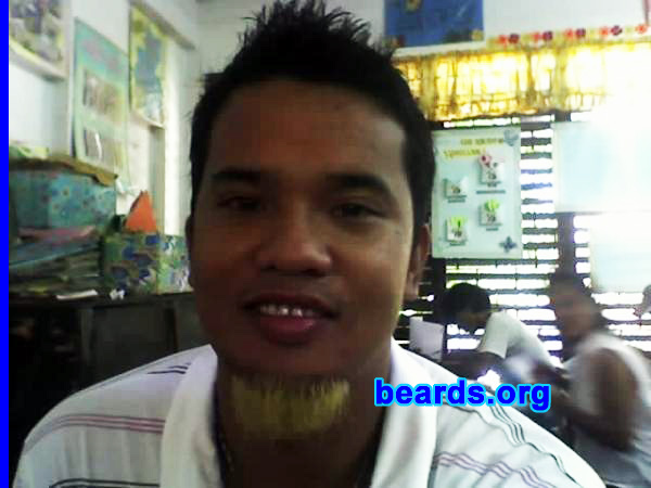 Erwin
Bearded since: 1998.  I am an experimental beard grower.

Comments:
I grew my beard because I look more mature.  And I really wanted to have one since childhood.

How do I feel about my beard?  Good, but I would love to have full beard.
Keywords: goatee_only