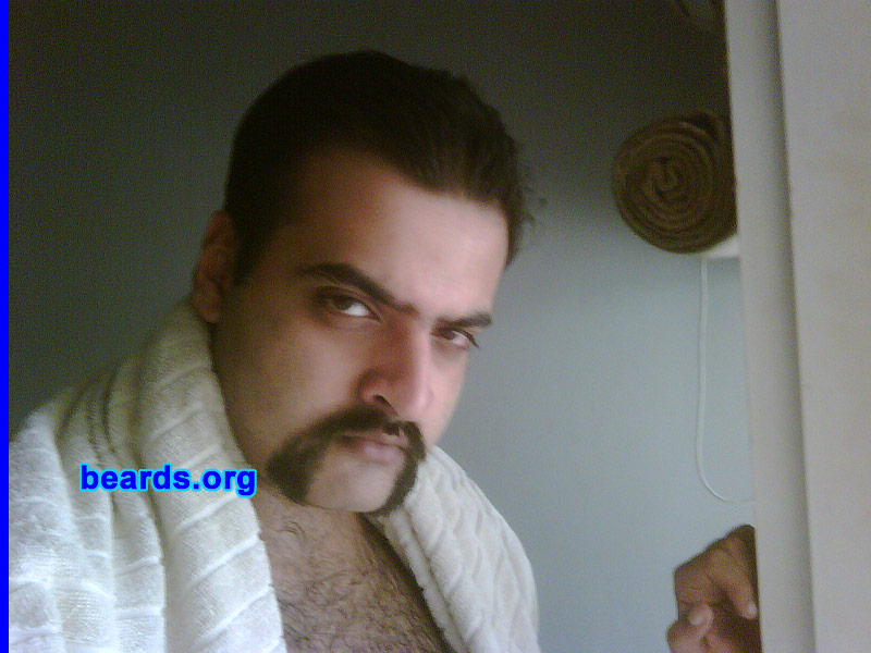 Ali B.
I am a dedicated, permanent beard grower.

Comments:
Recently I am growing mutton chops -- my latest style for 2011!

How do I feel about my beard? I feel great! Every time I grow a new style, I just feel proud! 
Keywords: horseshoe