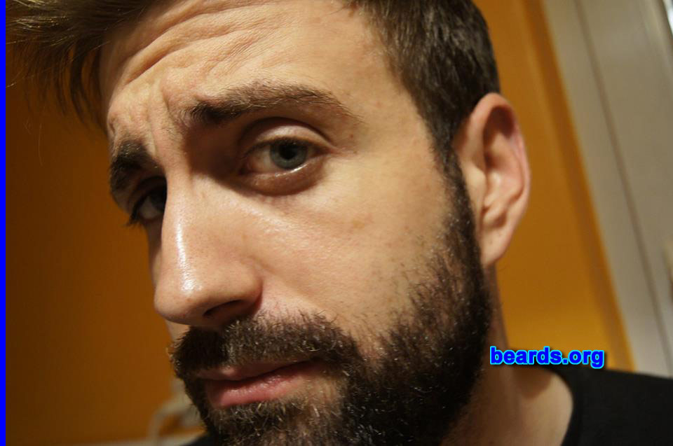 Filipe M.
Bearded since: 2013. I am an experimental beard grower.

Comments:
Why did I grow my beard? Because i believe I have a strong and nice beard.  And it definitely gives me a virile look. I also like to stroke my beard.

How do I feel about my beard?  It's strong and black and I think the genetics were kind with me. Maybe there are better beards around, but for sure more worse ones than better ones.
Keywords: full_beard