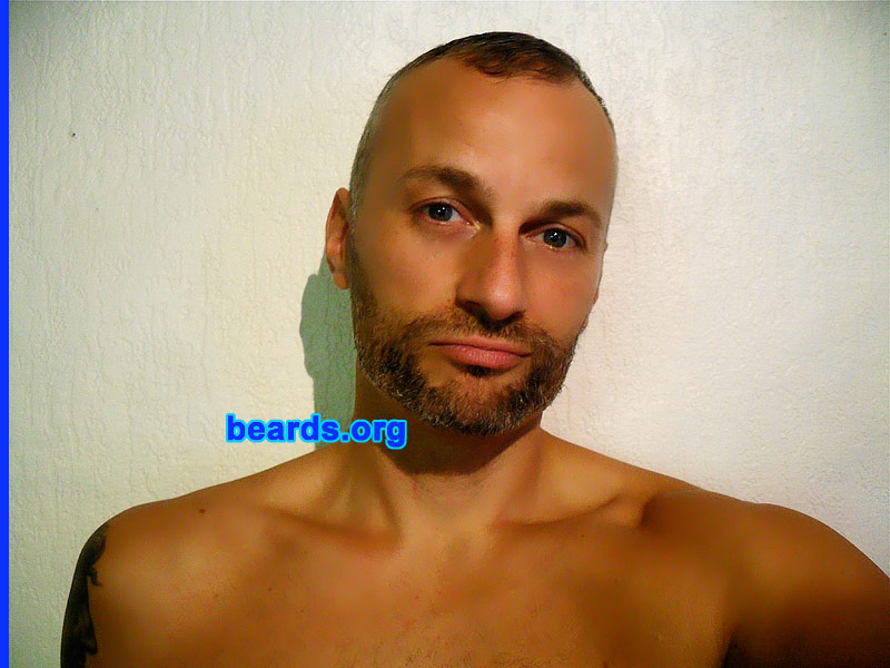 Alex
Bearded since: 2011.

Comments:
I was told I am sexy when have few days old beard.  So I thought I should give it a try with few weeks old beard, too.

How do I feel about my beard?  It feels like I have needles growing out instead of hairs.  So it's annoying.  But yes, I feel more masculine and sexy with the beard.
Keywords: full_beard