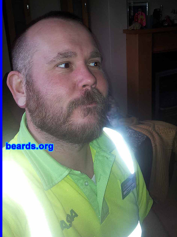 Andy R.
Bearded since: 2011. I am an experimental beard grower.

Comments:
Why did I grow my beard? Two reasons: Firstly, work was complaining about people with stubble and even went as far as sending people home to shave. As I like being awkward and rebellious i just turned round and said, "You can't make me shave.  I'm growing a beard". So I had to make a plan to grow one then. Secondly, and beards.org comes into this a LOT, I started researching the idea of growing a beard. I'm thirty-nine and aside from attempting to grow the odd goatee for a few weeks (which i usually tired of very soon after starting), I realised I've never let my beard grow out. I'd always presumed it just wouldn't provide decent coverage or grow enough.
Both of those lines of thought and researching beards.org and a few other sites brought on my proud declaration of "I'm growing a beard" -- much to the disgust of my wife.

How do I feel about my beard? I'm now at week ten roughly and I'm reaching that point where I told my wife I'd be getting rid of it (the beard). I now find myself shoe-horning into every conversation just how attached I am mentally to this beard. Just before Christmas, it ceased being my stubble and became an actual part of me and I have to say that most of the time, the idea of shaving it off turns me off - sometimes that thought repulses me.

A yeard (year-long beard) is appealing but so is matrimonial harmony so I think I may have to become a winter beard wearer.
Keywords: full_beard