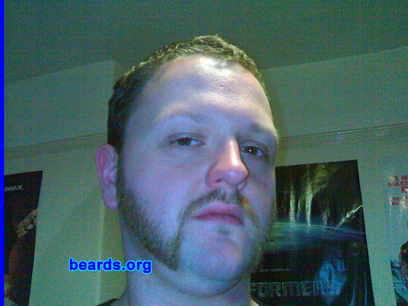 Dan M.
Bearded since: 2003.  I am a dedicated, permanent beard grower.

Comments:
I grew a beard for several reasons. Firstly, I have a very young-looking face that I thought could use a little distinction. Secondly, when I grew my first beard, none of my circle of friends had one. And finally, for practical reasons, a beard is useful in those chilly winter months.

How do I feel about my beard? I love my beard and feel bare without it. I have just switched to "friendly mutton-chops" for the first time and I am sure that it will draw some interesting comments at work, but I felt that it was time to try something new. My housemate thinks I look like a 19th century drill-sergeant...which can't be bad....can it?
Keywords: mutton_chops