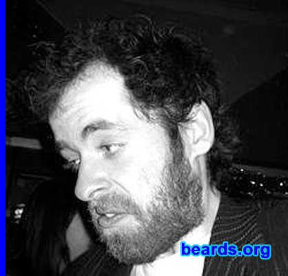 Dan C.
Bearded since: 2002.  I am a dedicated, permanent beard grower.

Comments:
I grew my beard because bearded people are better.  Plus, it saves time in the morning. Therefore, bearded people are more efficient. FACT.

How do I feel about my beard?  I love my, many-colored beard: black, brown, a touch of red, and a bit of white. I will never shave it off. The word "shave" makes me gag.
Keywords: full_beard