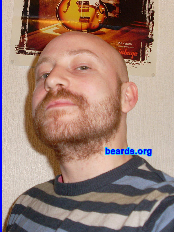 Darren C.
Bearded since: 2010.  I am an experimental beard grower.

Comments:
I grew my beard because it's something I've wanted to do since being a teen.  I have experimented growing different parts of my facial hair in the past but this time I am growing a full beard. It's something I think most men should do at least once in their lifetime.

How do I feel about my beard? I love it more with every day.  I just wish my girlfriend did! It's a bit thin on the sides, but I'm going to see how long it will get so will post more pics later on in the growing process.  It's been around four weeks since I last shaved.
Keywords: stubble full_beard