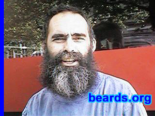 Mick (Mad Mick)
Bearded since: 1980.  I am a dedicated, permanent beard grower.

Comments:
I didn't grow my beard.  It grew all by itself.

I like it, although I always get searched and questioned at airports now.
Keywords: full_beard