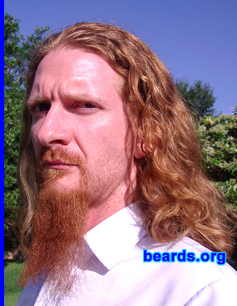 Garreth
Bearded since: 2003. I am an experimental beard grower.

Comments:
I grew my beard because, after leaving the corporate grind, I took the opportunity to grow a symbol of enduring freedom and individuality. I see it as a man's right to grow facial hair, and his duty to groom it to the best of his abilities.

I feel it commands respect, as an achievement and in terms of exercising personal choice. It is a great feeling to stroke it wistfully. 
Keywords: goatee_mustache