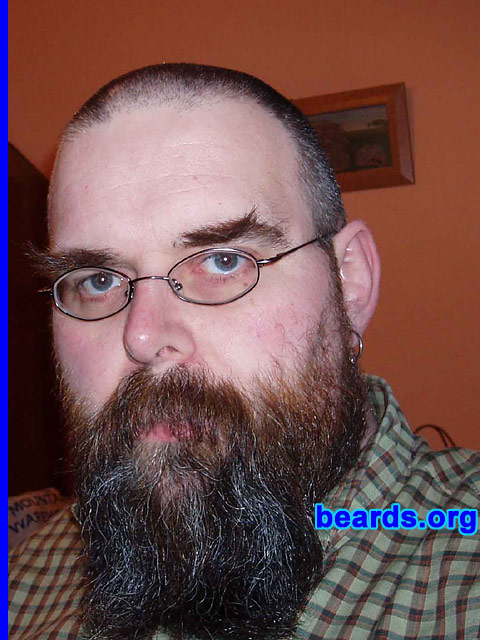 Gary
Bearded since: 1981 ( I've shaved it a time or two).  I am a dedicated, permanent beard grower.

Comments:
I grew my beard because I'd always wanted a beard, even as a child. One of my early memories is of sitting in a bath putting the bubbles on my chin to see what a beard would look like.

I'm very pleased with it. Having experimented with many different styles I now wear my beard without a moustache. I also feel that as I get older a longer beard is more fitting.
Keywords: full_beard