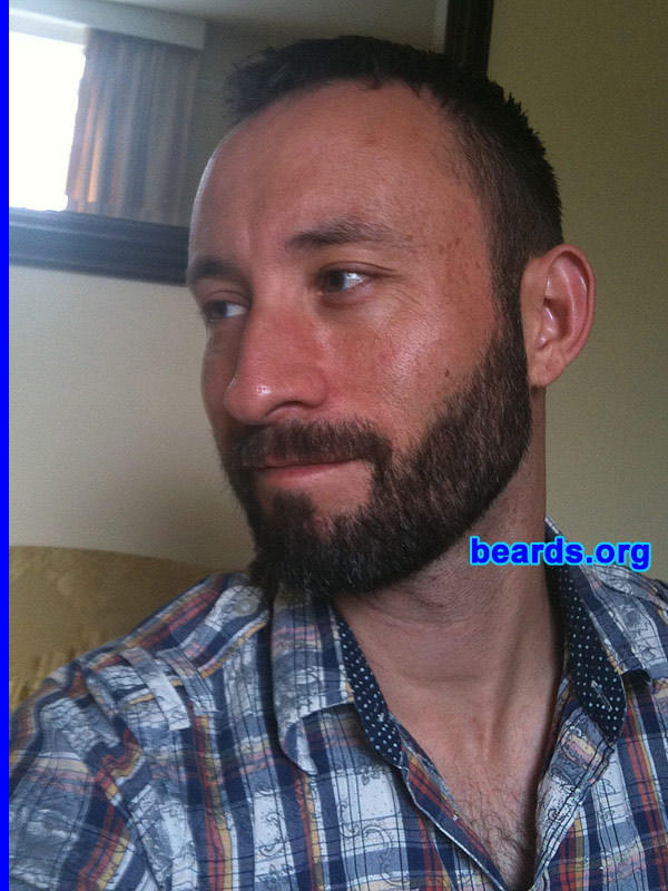 Greg
Bearded since: 2011. I am an experimental beard grower.

Comments:
I grew my beard because I've always appreciated the hirsute look and even admired men who have the courage to grow a full beard...  There's something fundamentally masculine and strong about the look and I wondered whether actually having one would affect the way I feel about myself and how I act in the world. Could it be that profound??

How do I feel about my beard? I love it. It's almost like I've gone out and bought a puppy. My beard is developing his own character!! I do feel more whole as a man, and for the first time, fully grown up, as strange as that may seem. I'm still experimenting with the shape and style, but I think a full beard is definately the way forward for me. The experiment continues...
Keywords: full_beard