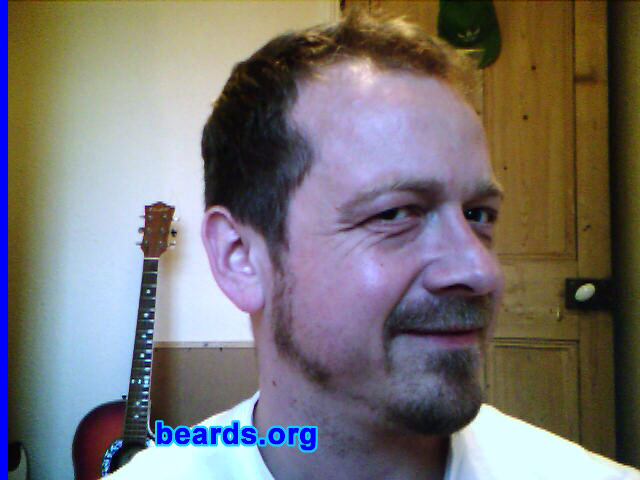 John
Bearded since: 1998.  I am a dedicated, permanent beard grower.

Comments:
I have always admired men with beards ever since I could remember and sort of slipped into having one during a period of unemployment originally and decided to let it grow to see what I could come up with. I've sort of sported one on and off since then, but have been a permanent grower since 1998. 

How do I feel about my beard?  I really do love my beard. It is a part of me and I cannot imagine myself without it. When I shaved it off once about two years ago I immediately began growing it again.It was just so weird being without it! I also recently changed jobs and made the choice that if I had to choose between either the beard or the job then the beard would have to win! Thankfully my employers are beard-friendly and it has been a pleasant surprise to discover that many of my male co-workers sport beards of all different varieties!
Keywords: goatee_mustache sideburns