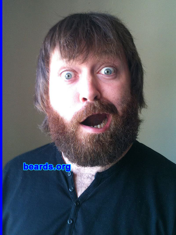 Jimmy
Bearded since: 2005.  I am an occasional or seasonal beard grower.

Comments:
I joined the Royal Air Force (RAF) before I was even able to grow a beard. As I matured, I was never given the opportunity to grow one as they are forbidden in the RAF. I once grew a mustache in 2002 which I kept for three months.  But it never really suited me.  So I removed it. In November 2005, I left the forces, shaved my head and grew a thick goatee. Since then I have had several beards of varying styles and sizes and always regret shaving them off!

How do I feel about my beard? At the moment I have two-month-old full beard. I have shaved my cheeks and neck as my beard grows from high up near my eyes right down to my chest almost! I always feel very attached and proud of my beard and find myself stroking it often!
Keywords: full_beard