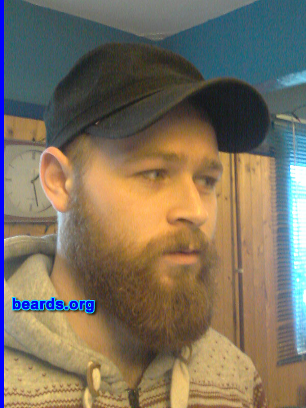 Rowan G.T.
Bearded since: 2013. I am a dedicated, permanent beard grower.

Comments:
Why did I grow my beard? I love beards! Always have a goatee and thought I'd go for the full beard. I hate being clean shaven.

How do I feel about my beard? I love my beard. I feel good about it. I want a longer beard. One day I'll go ZZ Top! I feel comfortable and it's natural to me. It's a conversation starter and an ice breaker.  The beard allows me to be different characters. It's just cool.
Keywords: full_beard