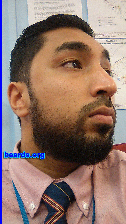 Shabaz S.
Bearded since: 2013. I am an experimental beard grower.

Comments:
Why did I grow my beard? I just realized that many men go throughout their whole lives without ever knowing what sporting a full grown beard might look like.

How do I feel about my beard? I'm trying it out to see how far I can go. I can say once it's past the itchy stage it's much easier to deal with. Liking the rugged look, and can't stop playing with it.
Keywords: full_beard