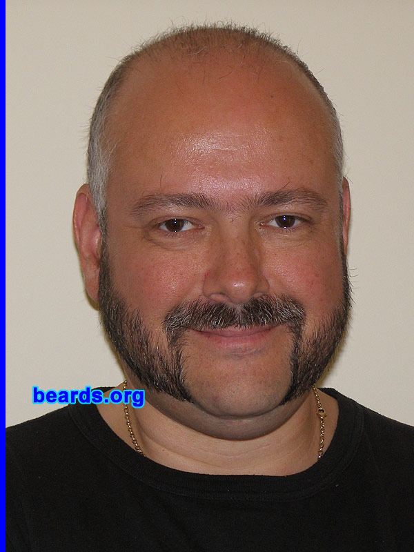 Tony
Bearded since: 1993.  I am a dedicated, permanent beard grower.

Comments:
I grew my beard because I thought it was time.

How do I feel about my beard?  I love it. It defines me.
Keywords: mutton_chops