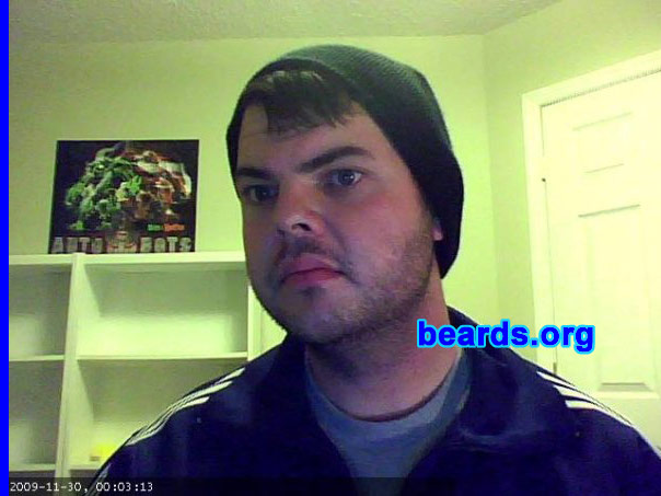 Dan P.
Bearded since: 2010.  I am an occasional or seasonal beard grower.

Comments:
I grew my beard because I spent 2005-2009 in the US Air Force and was required to shave nearly every day, except while on vacation. Initially, I grew my beard for about five months and then got antsy and shaved to handlebar. Currently, I have been growing my beard since May 2010.

How do I feel about my beard? I enjoy having a beard. I get lots of compliments. Sometimes people shout from afar, "Sweet beard!"  I'm twenty-seven and it is currently considered hip in my social circles to have a beard. I'm fairly impulsive and sometimes get the urge to shave or greatly trim, but my curiosity about how it might look in another six months motivates me to stick with it.
Keywords: stubble full_beard