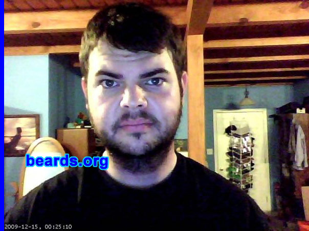 Dan P.
Bearded since: 2010.  I am an occasional or seasonal beard grower.

Comments:
I grew my beard because I spent 2005-2009 in the US Air Force and was required to shave nearly every day, except while on vacation. Initially, I grew my beard for about five months and then got antsy and shaved to handlebar. Currently, I have been growing my beard since May 2010.

How do I feel about my beard? I enjoy having a beard. I get lots of compliments. Sometimes people shout from afar, "Sweet beard!"  I'm twenty-seven and it is currently considered hip in my social circles to have a beard. I'm fairly impulsive and sometimes get the urge to shave or greatly trim, but my curiosity about how it might look in another six months motivates me to stick with it.
Keywords: full_beard