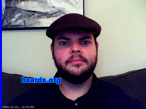 Dan P.
Bearded since: 2010.  I am an occasional or seasonal beard grower.

Comments:
I grew my beard because I spent 2005-2009 in the US Air Force and was required to shave nearly every day, except while on vacation. Initially, I grew my beard for about five months and then got antsy and shaved to handlebar. Currently, I have been growing my beard since May 2010.

How do I feel about my beard? I enjoy having a beard. I get lots of compliments. Sometimes people shout from afar, "Sweet beard!"  I'm twenty-seven and it is currently considered hip in my social circles to have a beard. I'm fairly impulsive and sometimes get the urge to shave or greatly trim, but my curiosity about how it might look in another six months motivates me to stick with it.
Keywords: full_beard