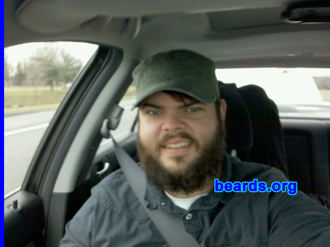 Dan P.
Bearded since: 2010.  I am an occasional or seasonal beard grower.

Comments:
I grew my beard because I spent 2005-2009 in the US Air Force and was required to shave nearly every day, except while on vacation. Initially, I grew my beard for about five months and then got antsy and shaved to handlebar. Currently, I have been growing my beard since May 2010.

How do I feel about my beard? I enjoy having a beard. I get lots of compliments. Sometimes people shout from afar, "Sweet beard!"  I'm twenty-seven and it is currently considered hip in my social circles to have a beard. I'm fairly impulsive and sometimes get the urge to shave or greatly trim, but my curiosity about how it might look in another six months motivates me to stick with it.
Keywords: full_beard