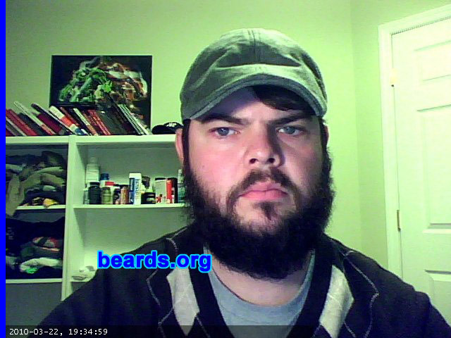 Dan P.
Bearded since: 2010.  I am an occasional or seasonal beard grower.

Comments:
I grew my beard because I spent 2005-2009 in the US Air Force and was required to shave nearly every day, except while on vacation. Initially, I grew my beard for about five months and then got antsy and shaved to handlebar. Currently, I have been growing my beard since May 2010.

How do I feel about my beard? I enjoy having a beard. I get lots of compliments. Sometimes people shout from afar, "Sweet beard!"  I'm twenty-seven and it is currently considered hip in my social circles to have a beard. I'm fairly impulsive and sometimes get the urge to shave or greatly trim, but my curiosity about how it might look in another six months motivates me to stick with it.
Keywords: full_beard