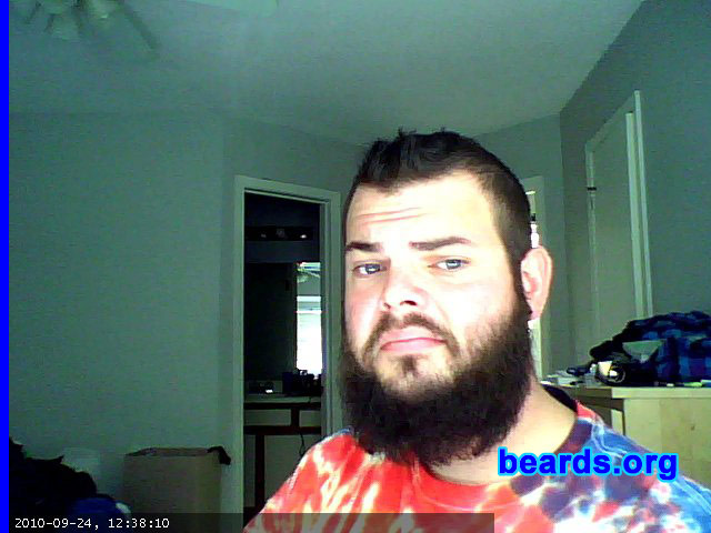 Dan P.
Bearded since: 2010.  I am an occasional or seasonal beard grower.

Comments:
I grew my beard because I spent 2005-2009 in the US Air Force and was required to shave nearly every day, except while on vacation. Initially, I grew my beard for about five months and then got antsy and shaved to handlebar. Currently, I have been growing my beard since May 2010.

How do I feel about my beard? I enjoy having a beard. I get lots of compliments. Sometimes people shout from afar, "Sweet beard!"  I'm twenty-seven and it is currently considered hip in my social circles to have a beard. I'm fairly impulsive and sometimes get the urge to shave or greatly trim, but my curiosity about how it might look in another six months motivates me to stick with it.
Keywords: full_beard