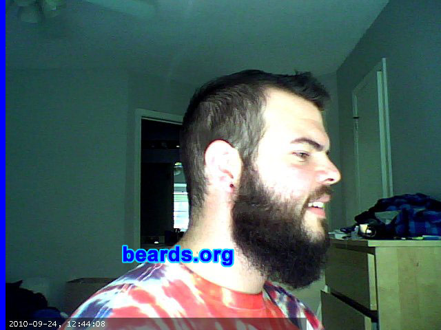 Dan P.
Bearded since: 2010.  I am an occasional or seasonal beard grower.

Comments:
I grew my beard because I spent 2005-2009 in the US Air Force and was required to shave nearly every day, except while on vacation. Initially, I grew my beard for about five months and then got antsy and shaved to handlebar. Currently, I have been growing my beard since May 2010.

How do I feel about my beard? I enjoy having a beard. I get lots of compliments. Sometimes people shout from afar, "Sweet beard!"  I'm twenty-seven and it is currently considered hip in my social circles to have a beard. I'm fairly impulsive and sometimes get the urge to shave or greatly trim, but my curiosity about how it might look in another six months motivates me to stick with it.
Keywords: full_beard