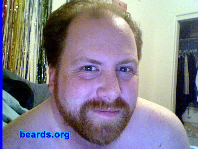 David
Bearded since: 2006.  I am an experimental beard grower.

Comments:
I grew my beard because I never wanted to "grow" up and for me this is a symbol of moving on and growing up...a true testament to my masculinity...becoming a man, so to speak, at 32 years old.
 
I think it looks sexy. A lot of my friends say I now look butch and then we just giggle like schoolgirls. My students just know I am plain odd. For me, I really like having it, but it does feel and look foreign sometimes.
Keywords: full_beard