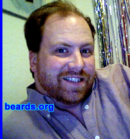 David
Bearded since: 2006.  I am an experimental beard grower.

Comments:
I grew my beard because I never wanted to "grow" up and for me this is a symbol of moving on and growing up...a true testament to my masculinity...becoming a man, so to speak, at 32 years old.
 
I think it looks sexy. A lot of my friends say I now look butch and then we just giggle like schoolgirls. My students just know I am plain odd. For me, I really like having it, but it does feel and look foreign sometimes.
Keywords: full_beard