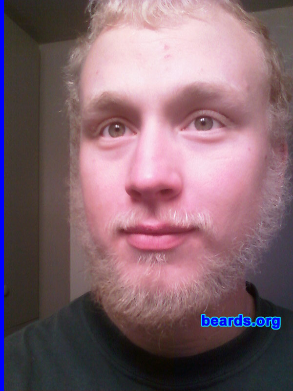 Merlin
Bearded since: 2010.  I am an experimental beard grower.

Comments:
I grew my beard, initially, to see if I could do it. I have very blond hair and facial hair and it had never grown all that well. So I decided to stop shaving for a couple months to see what would happen. Now I love how it looks and get compliments on it all the time. I have run into negative reactions, but the positive ones outweigh them by far.

How do I feel about my beard? I love my beard.  It keeps my face warm.  It's very unique in that you don't see a beard this color very often and it has helped me re-invent my image. I hope it gets thicker and fills in more, but overall I am very happy with it.
Keywords: full_beard