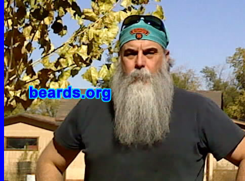 Steven
Bearded since: 1975. I am a dedicated, permanent beard grower.

Comments:
Why did I grow my beard? Though my first (at sixteen years old) facial display was a mustache and long sideburns, I grew my first beard immediately upon discharge from the military. I have always liked beards, particularly full ones. I've always had facial hair of one form or another and a full beard has probably been the higher percentage over the years. Probably about the last year or year and a half, I've gone "full natural". It is fun being a part of the present interest that is going on, but I had a beard before it all came about, and will have one after, if it were to die off.

How do I feel about my beard? I fully enjoy it. I sometimes wish it were more dense.  But, it is what it is.  So I just "Keep on Trucking", as the ole saying goes. Its color and size has drawn my interest to perhaps try the Santa gig this coming Christmas.  We shall see. : )
Keywords: full_beard