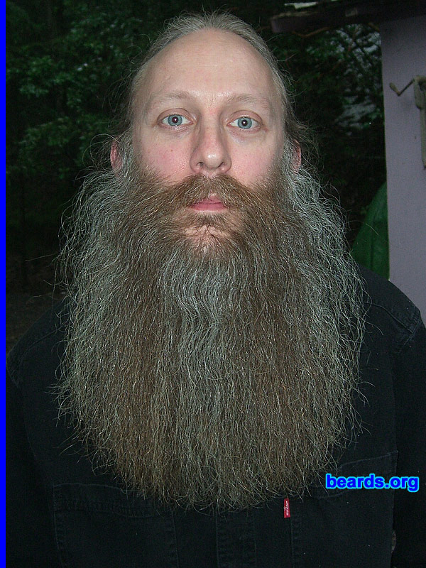 Aarne
Bearded since: 1985.  I am a dedicated, permanent beard grower.

Comments:
This is my latest (2007) version of my beard. It's warm in the winter and cool in summer. I run from any scissors.  Whenever I get close to scissors, I regret it. 

How do I feel about my beard?  Comfortable. I love the stares I get. Go ahead and grow a beard. And not just a 2 incher. My minimum is 3 inches no matter what style. At that length it becomes soft and comfy rather than harsh, stubby, unruly, and irritating . My wife loves it too.
Keywords: full_beard
